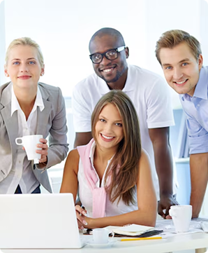 Team members collaborating at a desk