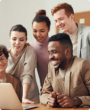Team members collaborating at a desk
