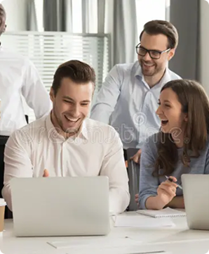Team members collaborating at a desk